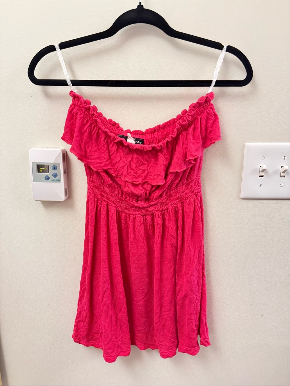 pink top with ruffle layer on top
